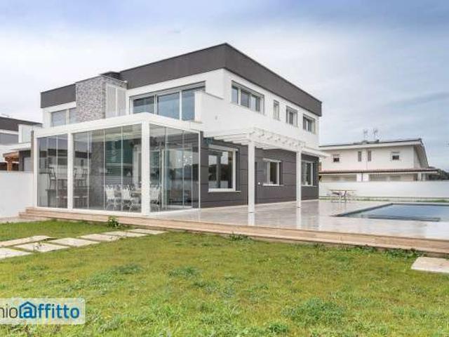 Villa arredata con piscina Infernetto, axa, casal palocco, madonnetta a roma