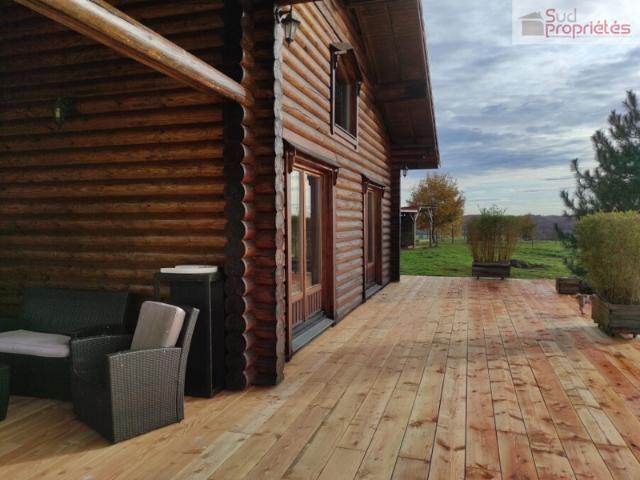 Villa en rondins avec 4,7ha de terres irrigables et une vue déga