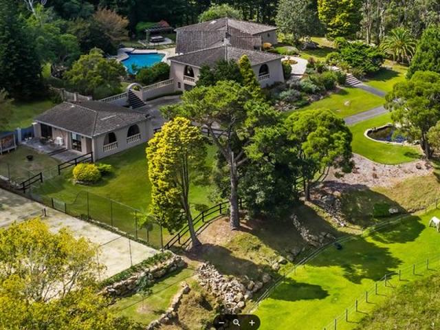 A private paradise an exceptional acreage resort complete with horse facilities, pool, tennis court and guest quarters
