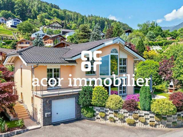 Villa mit spektakulären Volumen gegenüber den Alpen