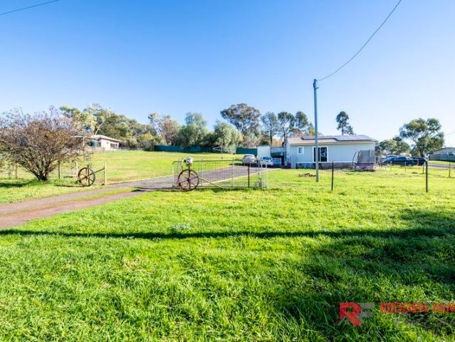 Village Charm on a Spacious Half Acre Block!