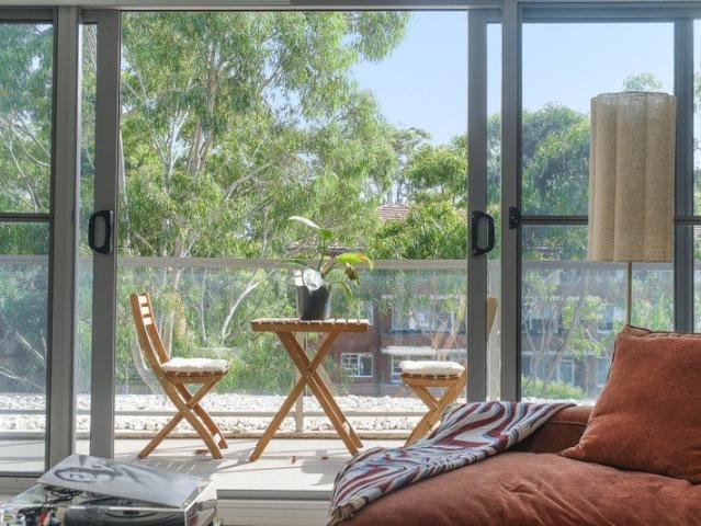 Village Lifestyle Meets Sunlit Top Floor Living with Serene Leafy Views