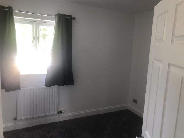 Village location, refurbished 2 bedroom home in private mews development