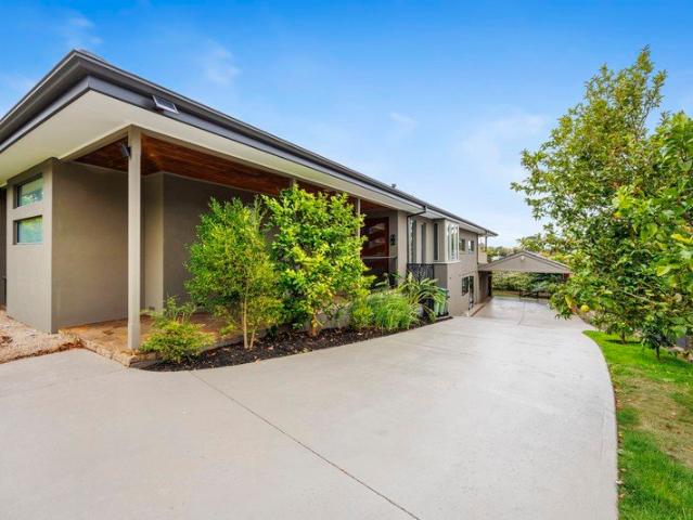 Village side Sophistication with Bay Glimpses & Dual Living