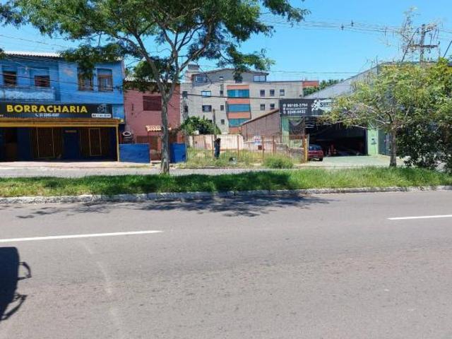 VILLARINHO VENDE TERRENO VAZIO COM 311m² NA CAVALHADA FRENTE AO MAC DONALD E R
