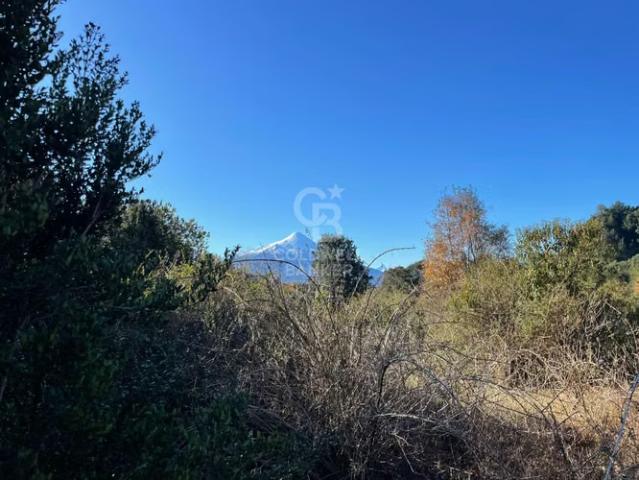 Vista al Volcán con rio que cruza el condominio | Ensenada | 0 dormitorios por 1450.00 en Puerto Varas