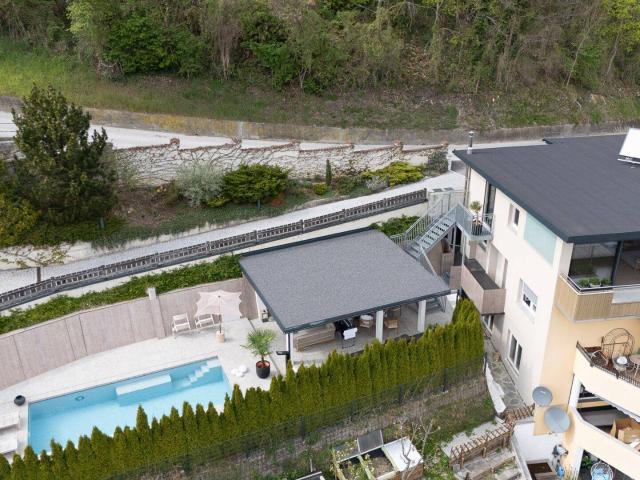 VOMP Luxus Maisonette Wohnung mit Swimmingpool und einer traumhaften Aussicht auf die Tiroler Bergwelt zum Verkauf