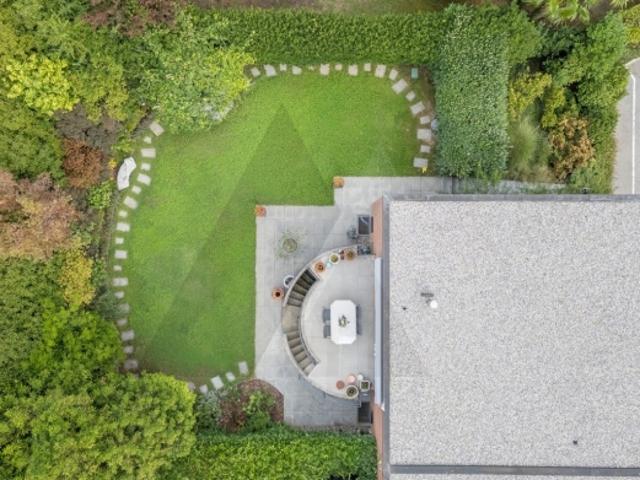 VON ATTILIO PANZERI ENTWORFENES HAUS MIT GARTEN IN GENTILINO