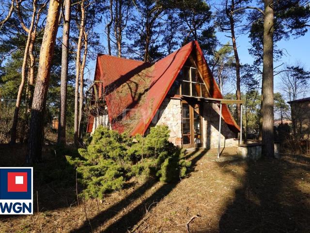 Polecam dom rekreacyjny z dużą działką i potencjałem do zamieszkania