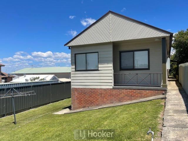 WANT TO LIVE BY THE LAKE? WELL THIS UNIT IS FOR YOU! FRESHLY RENOVATED