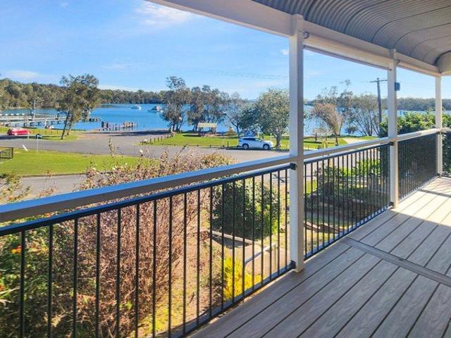Wake up to breathtaking views across Wallis Lake and embrace the relaxed coastal lifestyle!