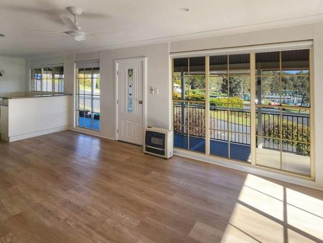 Wake up to breathtaking views across Wallis Lake and embrace the relaxed coastal lifestyle!