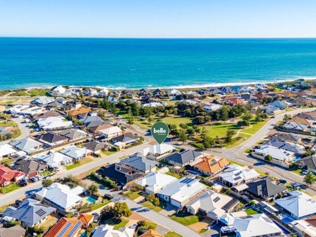 Wake up to park views, walk to the beach