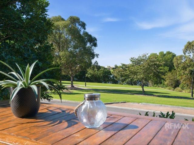 Wake Up to Parkland & Lake Views