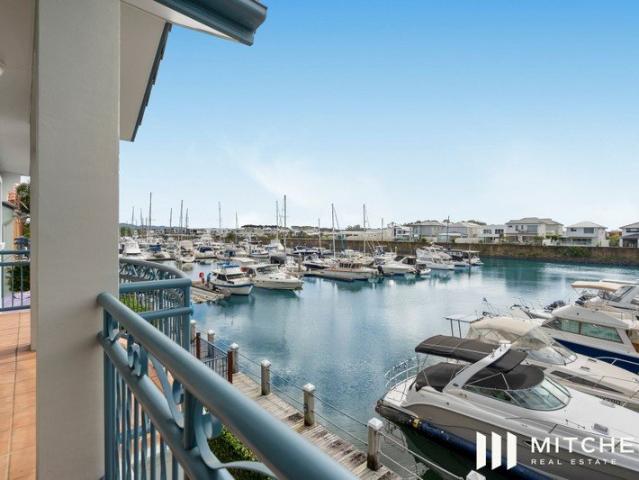 Wake Up to Water Views Hope Island Haven Designed for Coastal Living