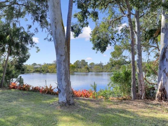 Wake Up to Water Views. Walk to the Beach. Live the Woodgate Lifestyle You've Been Dreaming Of