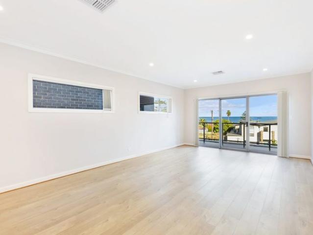 Walk to the Beach & Enjoy Ocean Views from your Balcony