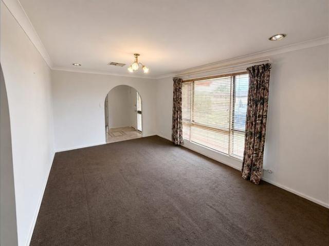 Walk to the beach from the wonderfully located 4 bedroom, 2 bathroom home