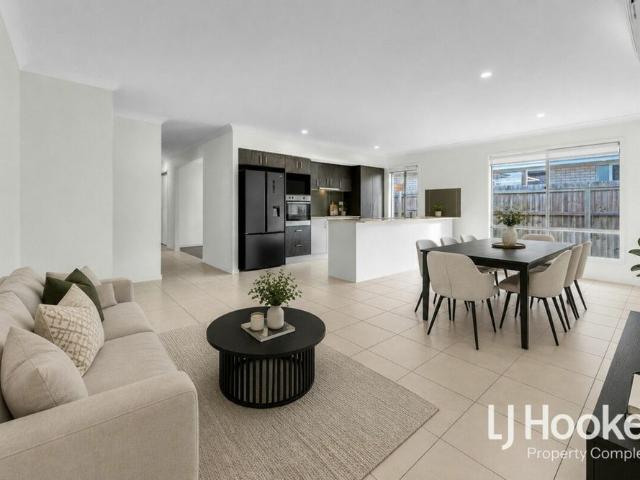 Walking Distance to Schools 2 x Living Zones Great Backyard