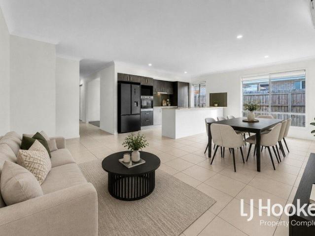 Walking Distance to Schools 2 x Living Zones Great Backyard