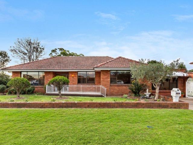 Warm, Welcoming Family Classic on Corner Block with Hill Views and Double Garage