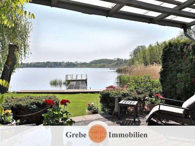 Wassergrundstück, Haus mit 4 Wohnungen, Scheune, Bungalow direkt am See und zusätzliches Bauland