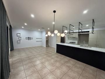 Rare 4 Bedroom Townhouse with Double Garage & Courtyard in the Heart of the City!