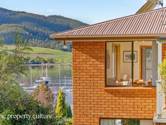 Water Views and Acreage in Sun Soaked Position