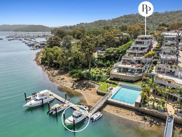 Waterfront Apartment with Private Berth & Pool.