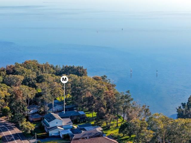 Waterfront getaway with dual accommodation