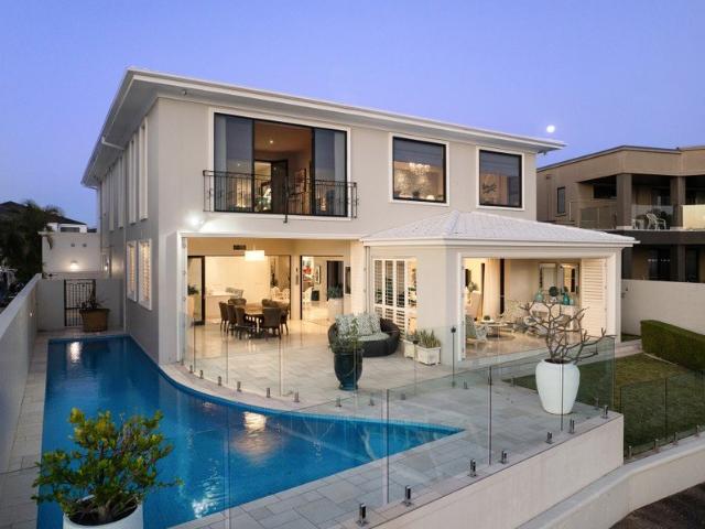 Waterfront Grandeur with Direct Broadwater Access