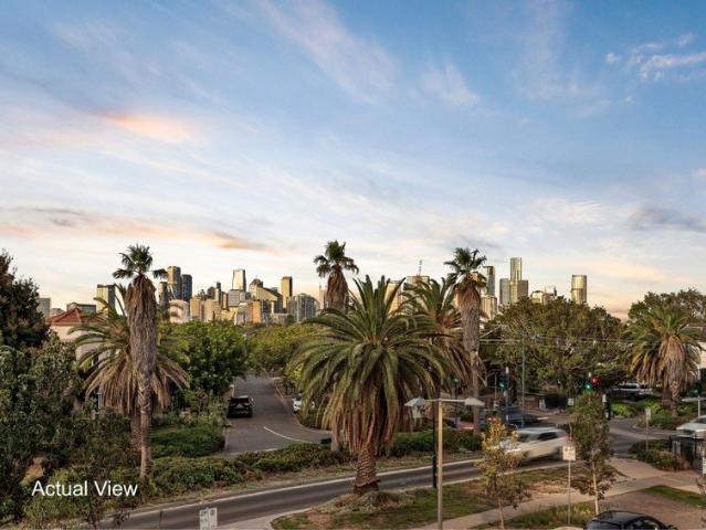 Waterfront Luxury with Dual Balconies and Uninterrupted City Views