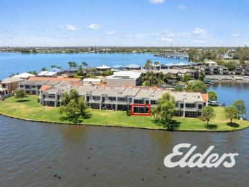 Waterfront Luxury with Dual Income Potential