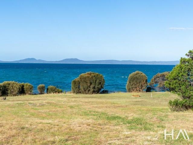Waterfront land with stunning coastal views