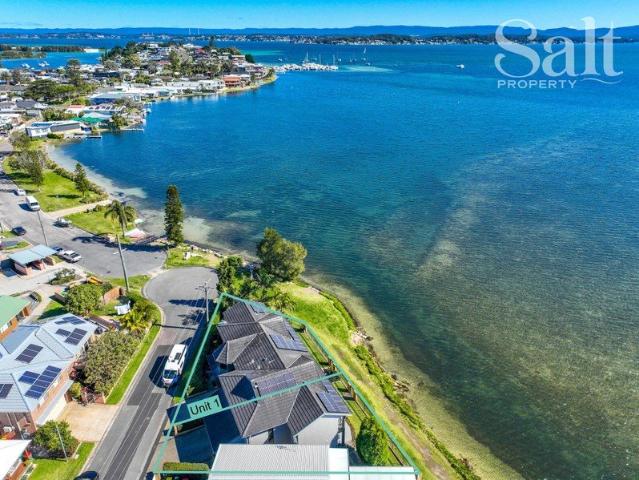 Waterfront living that's absolutely unforgettable!
