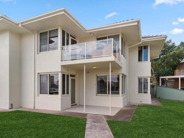 Waterfront Living with Marina Views in a Highly Sought After Setting
