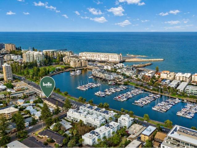 Waterfront Living with Marina Views in a Highly Sought After Setting