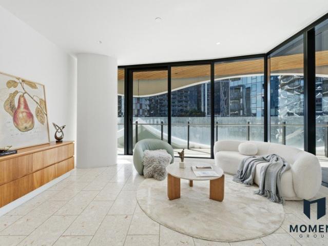 Waterfront Living with an Expansive Wraparound Terrace