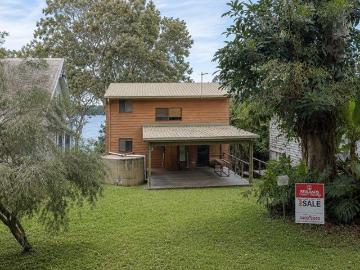 Waterfront Living with Character, Warmth & Stunning Sunrises Option to Buy Furnished