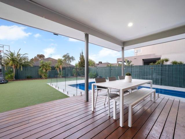 Waterfront Living With Poolside Entertaining