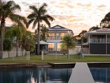 Waterfront Living with Sweeping Views and Shared Jetty