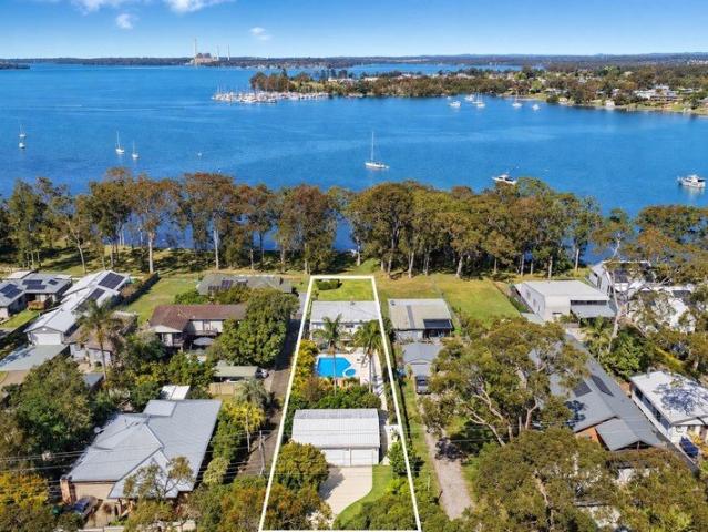 Waterfront living with sweeping views