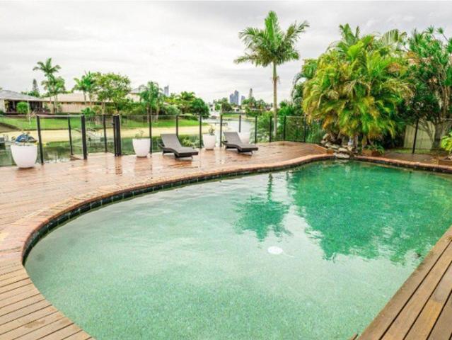 Waterfront living with views, a pool and basketball!