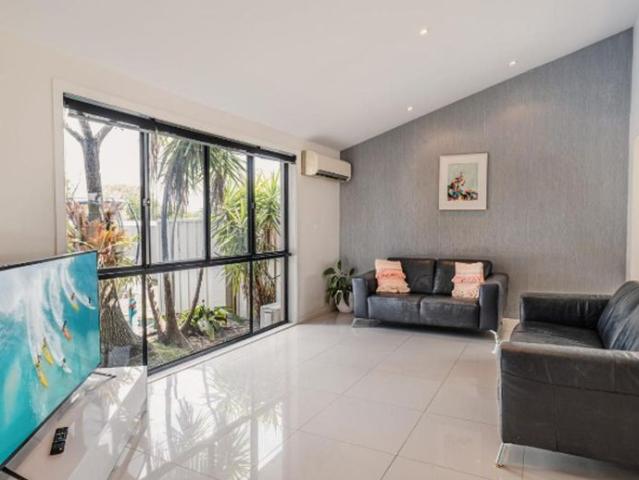 Waterfront living with views, a pool and basketball!