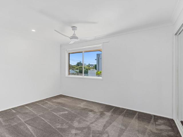 Waterfront Living Covered Balcony with Direct Canal Views