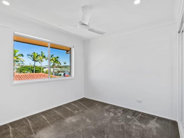 Waterfront Living Covered Balcony with Direct Canal Views