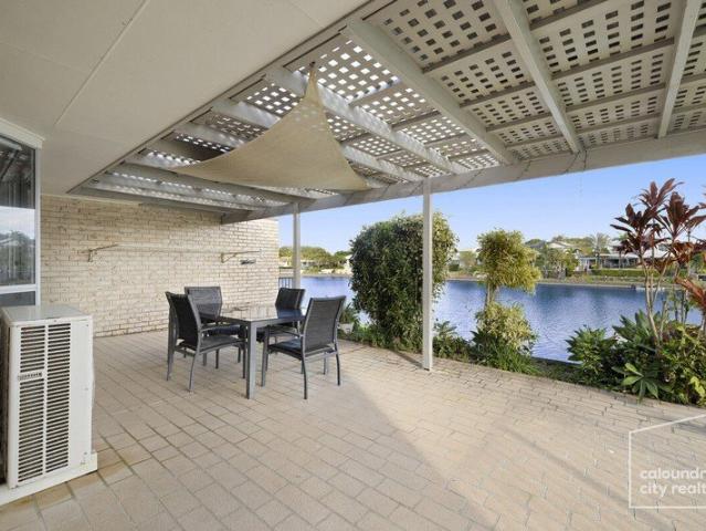 Waterfront Living Moments from the Beach!