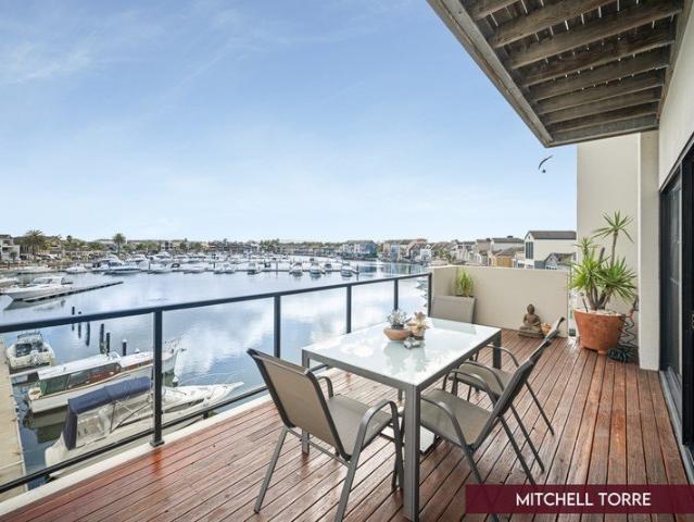 Waterfront penthouse including two carparks, two storage cages & boat mooring