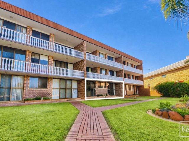 Ground Floor Waterfront Apartment | Passage Views + Renovation Upside