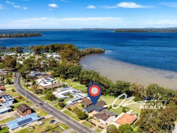 WATERFRONT RES STUNNING LOCATION PANORAMIC WATER VIEWS POTENTIAL HOLIDAY INCOME RETURNS SOLD FULLY FURNISHED
